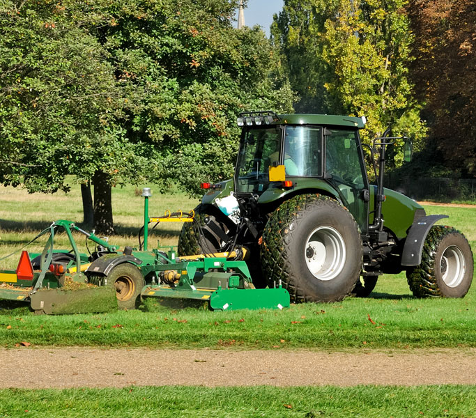 Tractor mowing a lawn